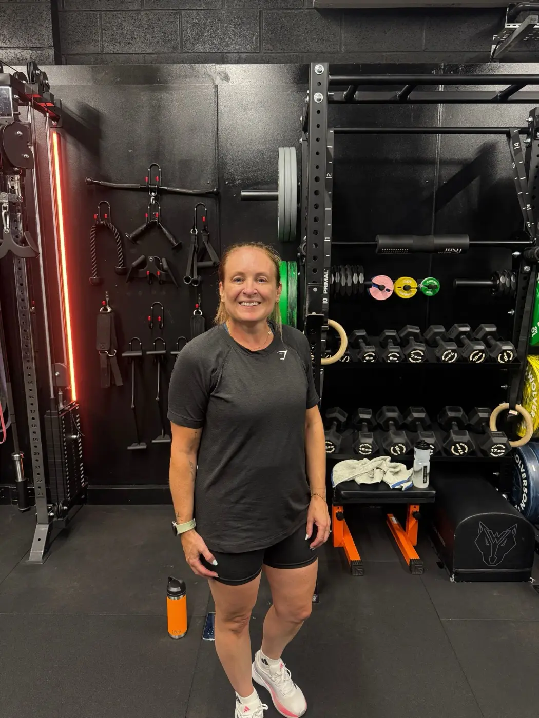 Jo smiling in the gym at IGNYT Fitness